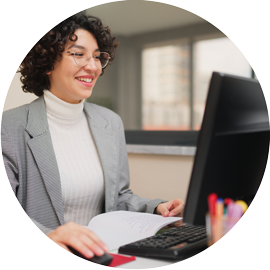 Make Payments Woman on computer